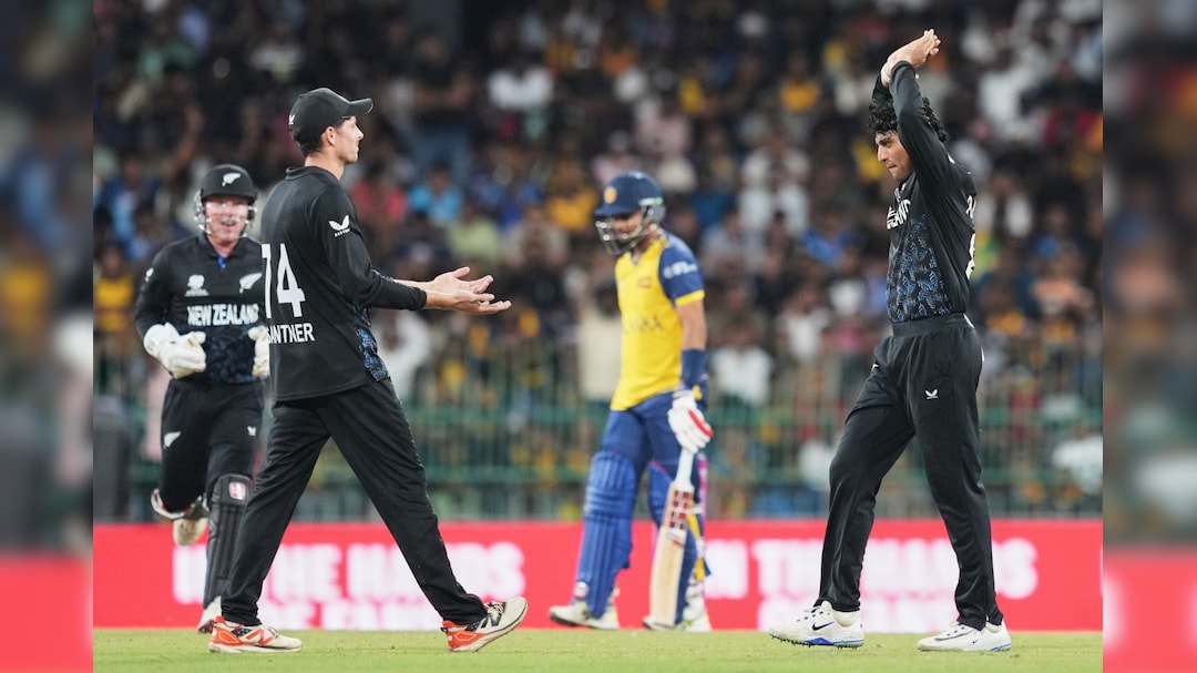New Zealand players celebrate after a dominant victory over Sri Lanka to improve their semi-final qualification chances.
