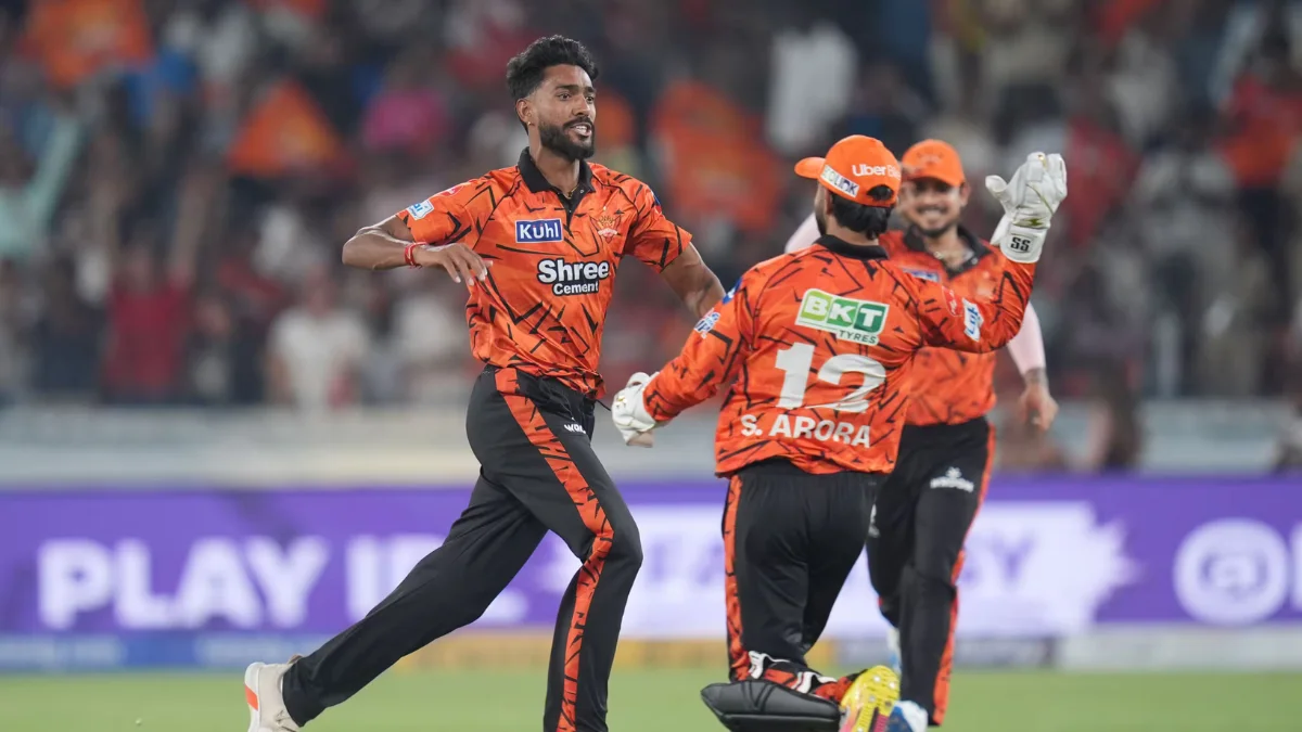 Sunrisers Hyderabad players celebrate victory after defeating Rajasthan Royals in Match 21 of IPL, showcasing strong team performance on the field.