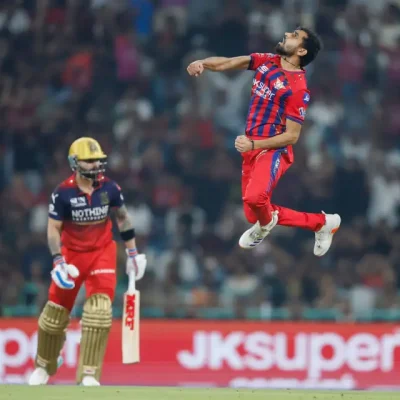 Lucknow Super Giants batter Mitchell Marsh celebrates his century against Royal Challengers Bengaluru in IPL 2026.